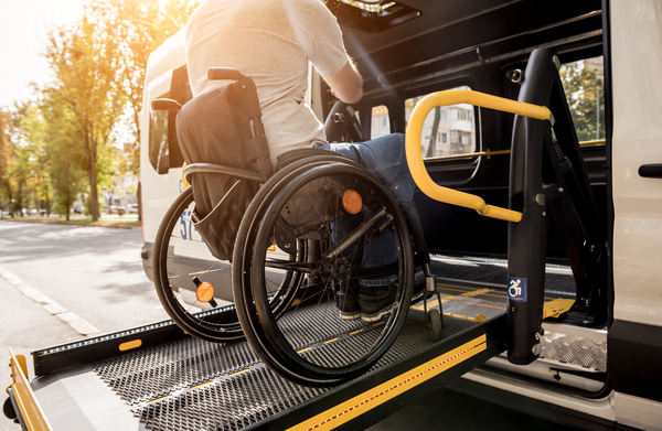 A,Man,In,A,Wheelchair,On,A,Lift,Of,A